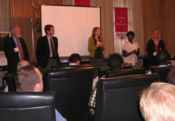 Family members Dain Perry and James DeWolf Perry, Director Katrina Browne, and Ann Clanton and Toby Ayers of RICJ at the Bank of America in Providence, R.I., September 2008